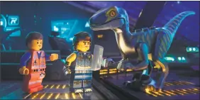  ?? Warner Bros. Pictures via the Associated Press ?? Emmet, left, and Rex Dangervest, center, both voiced by Chris Pratt, in a scene from “The Lego Movie 2: The Second Part.”