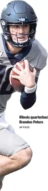  ?? AP FILES ?? Illinois quarterbac­k Brandon Peters