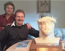  ?? JERRY CARINO ASBURY PARK PRESS ?? Lillian and John Eagan with John’ s life-size bust of Jesus made from recycled church candles.