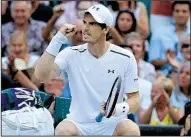  ?? AP/ALASTAIR GRANT ?? Andy Murray of Great Britain defeated Italy’s Fabio Fogini 6-2, 4-6, 6-1, 7-5 at Wimbledon on Friday. He trailed Fogini 5-2 in the fourth set before rallying to win the final five games for the victory.