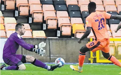  ??  ?? HOME LOSS: Vale keeper Scott Brown is called in to action, while, below, Tom Pope reacts after missing a penalty in the second half of the 1-0 defeat by Carlisle. Pictures: Steve Bould