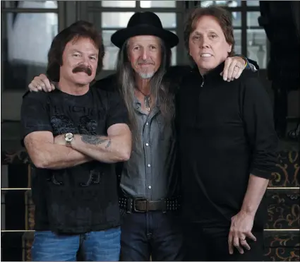 ?? ASSOCIATED PRESS ?? This file photo shows three members of The Doobie Brothers, from left, Tom Johnston, Pat Simmons, and John McFee, in Nashville, Tenn.