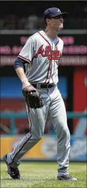  ?? PATRICK MCDERMOTT/GETTY IMAGES ?? Atlanta’s Max Fried reacts after being hit by a liner by the Nationals’ Spencer Kieboom in the second inning of Game 1. Fried exited after the inning.