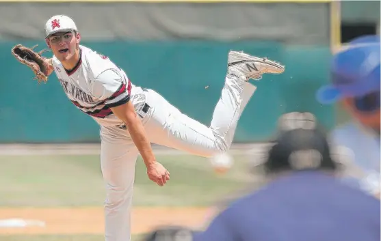 ?? | ALLEN CUNNINGHAN/ FOR THE SUN- TIMES ?? St. Viator football star Cole Kmet, who is headed to Notre Dame, was strong on the mound and at the plate against Marmion on Friday.