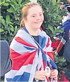  ?? ?? Team player Cerys McCrindle, of Prestwick, draped in the Union Jack