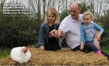  ?? PHOTO: ANDREW O’HALLORAN ?? Sean Ring with his daughters Mairead and Aine on the farm in Castlecome­r, Co Kilkenny