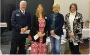  ?? (Special to The Commercial) ?? Food pantry representa­tives were Capt. Jason Perdieu (left), Susan Wolfe, KayLynn Johnston and Pat Tate.