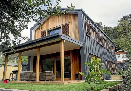  ?? PHOTO: STACY SQUIRES/STUFF ?? The simple form of this new Christchur­ch Passive House helps keep it comfortabl­e and energy efficient.