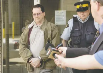  ?? RICHARD MARJAN ?? Edouard Bonamie is shown being taken from a Saskatoon courtroom in 2006 after being convicted of a fraud in that city. He has been found guilty of the same charge in an Ottawa courtroom.