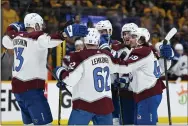  ?? MARK ZALESKI - THE ASSOCIATED PRESS ?? Colorado Avalanche left wing Artturi Lehkonen (62) celebrates with teammates after scoring a goal against the Nashville Predators during the first period in Game 3 of an NHL hockey Stanley Cup first-round playoff series Saturday, May 7, 2022, in Nashville, Tenn.