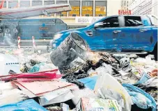  ?? /The Times ?? Chaos: The streets of Johannesbu­rg were left with bins full of rubbish after the city failed to renew a multimilli­onrand contract with Avis SA on time.