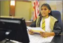  ??  ?? Valeria Rangel, 10, playing a court judge, participat­es in a mock trial Friday at the Regional Justice Center.