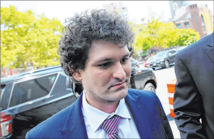  ?? Michael M. Santiago Tribune News Service ?? Former FTX CEO Sam Bankman-fried arrives for a hearing in August at Manhattan federal court. The cryptocurr­ency exchange founder was convicted of fraud.