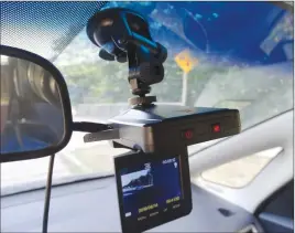  ?? Canadian Press photo ?? A dashboard camera is shown in a recent photo. Dashcams are being praised as protection while driving.