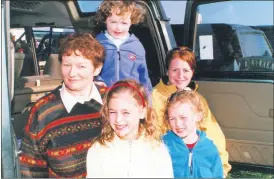  ?? ?? West Waterford racing fans in Ballynoe, Linda Condon (back right) from Tallow, with members of the Troy family, Olive, Mary, Rachel and Niamh, soaking up the sunshine at the point-to-points in Ballynoe in 2002.