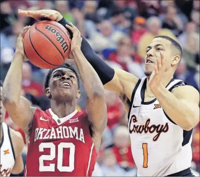  ?? [ORLIN WAGNER/THE ASSOCIATED PRESS] ?? BOSTON COLLEGE 91, N.C. STATE 87: Oklahoma State’s Kendall Smith blocks a shot by Oklahoma’s Kameron McGusty during the Big 12 tournament in Kansas City, Mo.
NOTRE DAME 71, VIRGINIA TECH 65:
COLORADO 97, ARIZONA STATE 85: FIRST FOUR March 13 and 14...