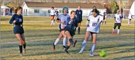  ?? ?? Bishop’s Jillian Veenker takes a shot during the Broncos 5-0 win over Desert on Jan. 31 in Bishop.