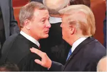  ?? Reuters ?? US President Donald Trump (right) with Supreme Court Chief Justice John Roberts. The two clashed in a public dispute over the independen­ce of America’s judiciary.