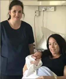  ??  ?? Juliana Henry, Director of Midwifery at Sligo University Hospital with Elaine Quinn and her baby girl at the launch of maternal wellbeing initiative at the hospital.