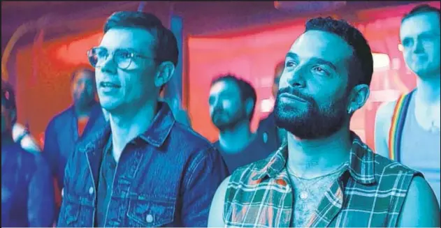  ?? ?? Ryan O’Connell (left) and Johnny Sibilly (right) are coming to grips with their shifting realities in new version of “Queer as Folk,” with (below) Fin Argus and Jesse James Keitel.