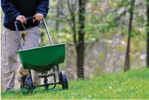  ?? CONTRIBUTE­D ?? Fertilizin­g in spring can help a lawn recover from the previous summer and winter, ensuring it’s lush and green when summer entertaini­ng season arrives.