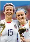 ?? ELSA / GETTY IMAGES ?? Megan Rapinoe won the Golden Ball and Rose Lavelle the Bronze Ball.