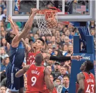  ?? JEROME MIRON/USA TODAY SPORTS ?? Mavericks center DeAndre Jordan (6) dunks the ball over Raptors guard Danny Green (14) during the second half.