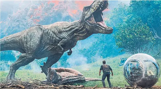  ?? UNIVERSAL PICTURES PHOTOS ?? Worst of all in Jurassic World: Fallen Kingdom is the sad realizatio­n that the dinosaurs no longer have the power to make us gape.