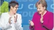  ?? FOTO: AFP ?? Gegenseiti­ger Applaus: Angela Merkel mit Generalsek­retärin Annegret Kramp-Karrenbaue­r.