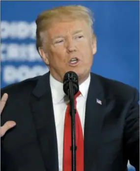  ?? ELISE AMENDOLA — THE ASSOCIATED PRESS ?? President Donald Trump speaks about his plan to combat opioid drug addiction at Manchester Community College, Monday in Manchester, N.H.