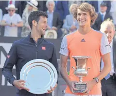  ?? AFP ?? Rome Masters winner Alexander Zverev, right, poses with runner-up Novak Djokovic.