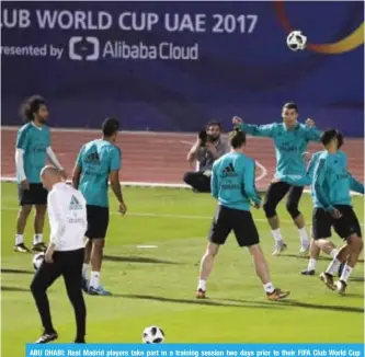  ??  ?? ABU DHABI: Real Madrid players take part in a training session two days prior to their FIFA Club World Cup semi-final football match at the New York University Abu Dhabi stadium in the Emirati capital yesterday. -—AFP