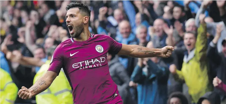  ?? — GETTY IMAGES ?? Manchester City’s Sergio Aguero celebrates after scoring his third goal during his team’s English Premier League game against Watford on Saturday.