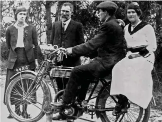  ??  ?? Pre-world War I antipoean antics on a Rudge, with lady pillion sidesaddle. Watch that flappy dress, madam!