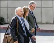  ?? Irfan Khan Los Angeles Times ?? DR. JAMES HEAPS, right, has denied wrongdoing after being accused of sexual abuse. UC reached a $73-million settlement with 5,500 former patients.