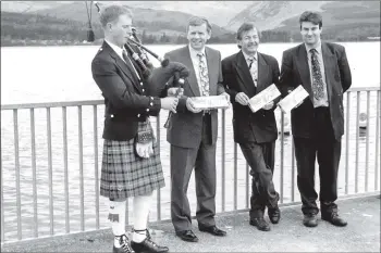  ?? B16twe04 ?? Rhod Sharp of Radio 5 Live visited Arran to get material for an article. The picture l to r shows: piper Willie Robertson, Frank Masson, Rhod Sharp and Charles MacVicar of Paterson Arran.