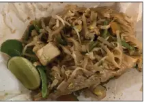  ?? (Arkansas Democrat-Gazette/Eric E. Harrison) ?? The kitchen at kBird rolled our Pad Thai with tofu in a piece of butcher paper instead of a to-go container.