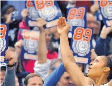  ?? ASSOCIATED PRESS FILE ?? In this 2010 file photo, Connecticu­t’s Maya Moore celebrates her team’s then-record 89th consecutiv­e victory.