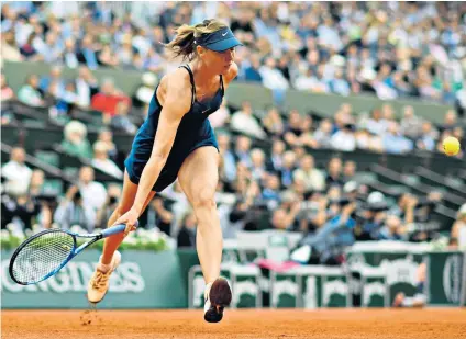  ??  ?? Quick defeat: Maria Sharapova plays a return during her quarter-final defeat by Garbine Muguruza of Spain