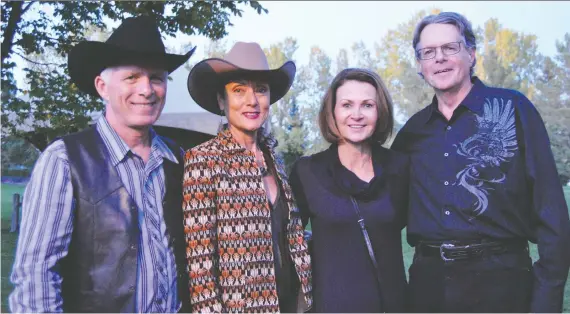  ?? PHOTOS: HERITAGE PARK ?? Attending the 31st annual Shindig fundraiser in support of Heritage Park are Paul Corbett, left, and wife Alida Visbach, Heritage Park president and CEO, and Debbie and Dave Rodych, Heritage Park Society board chair. This was Visbach’s last Shindig as she is retiring from Heritage Park at the end of the year.