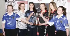  ??  ?? Students from Colaiste Muire,Mercy College and St Attractas Community School hold the Lisa Niland Memorial Perpetual Cup.