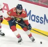  ?? LYNNE SLADKY/AP ?? Florida Panthers center Carter Verhaeghe handles the puck against the Carolina Hurricanes on May 24 in Sunrise.