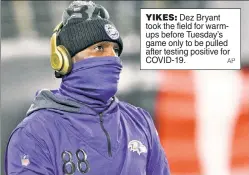  ?? AP ?? YIKES: Dez Bryant took the field for warmups before Tuesday’s game only to be pulled after testing positive for COVID-19.