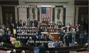  ?? HOUSE TELEVISION VIA AP ?? In this image from House Television, the final total on the vote on the Republican­s health care bill is displayed at the Capitol in Washington on Thursday. It’s “Trumpcare” now, and Republican­s have to answer for it. After dozens of symbolic votes,...