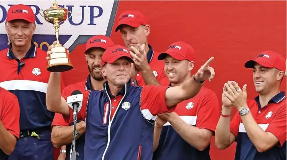  ?? Picture: Anthony Behar/PA ?? Steve Stricker, centre, celebrates with the United States team after victory in the Ryder Cup at Whistling Straits