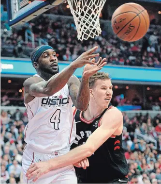  ?? NICK WASS THE ASSOCIATED PRESS ?? Washington Wizards guard Ty Lawson passes the ball against Toronto Raptors centre Jakob Poeltl.