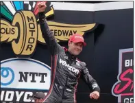  ?? (AP/Darron Cummings) ?? Will Power celebrates after winning on the Indianapol­is Motor Speedway’s road course Saturday. It was Power’s 40th career IndyCar Series win, breaking a tie with Al Unser for fifth on the circuit’s all-time list.