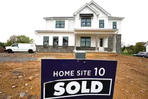  ?? (AP Photo/matt Rourke, File) ?? A home under constructi­on marked as "SOLD" at a developmen­t April 28, 2023, in Eagleville, Pa. The United States is slogging through a housing affordabil­ity crisis that was decades in the making. The shortage pours cold water on President Joe Biden's assurances that the U.S. economy is strong and underscore­s the degree to which Republican presidenti­al candidate, former President Donald Trump, has largely overlooked the issue.