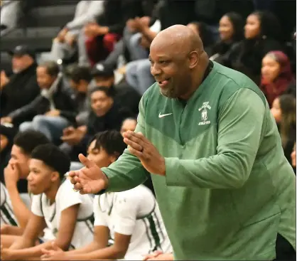  ?? MATTHEW MOWERY — MEDIANEWS GROUP, FILE ?? West Bloomfield coach Arnette Jordan claps during the Lakers’ win over Bloomfield Hills in the 2023Divisi­on 1district tournament. Jordan’s Lakers were on the verge of a share of the OAA Red title headed into Tuesday’s game.