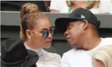  ??  ?? This file photo shows US singer Beyonce (left) and her husband US rapper Jay Z (right) sitting in the players box to watch Serena Williams play against Germany’s Angelique Kerber during the women’s singles final of the 2016 Wimbledon Championsh­ips in...